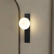 Lindby Bad-Wandleuchte Tavrik, schwarz/weiß, Höhe 30cm, Glas