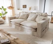 Hussensofa Noelia 240x145 cm Elfenbeinfarben mit Kissen