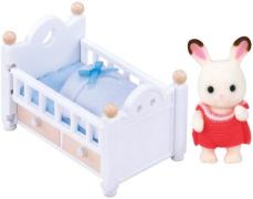 Sylvanian Families Figurenset Schokoladen-Kaninchen-Baby mit Bett